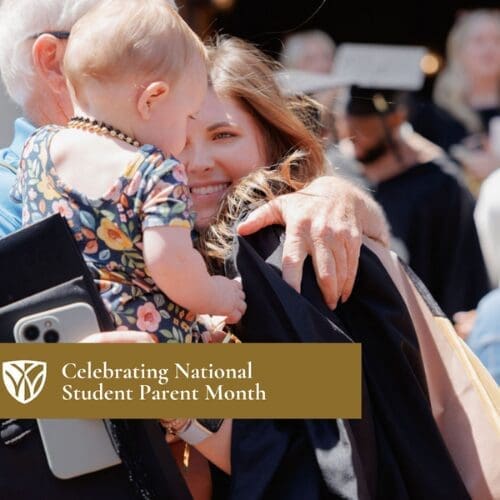 A parent and child at Wake Forest SPS commencement embracing